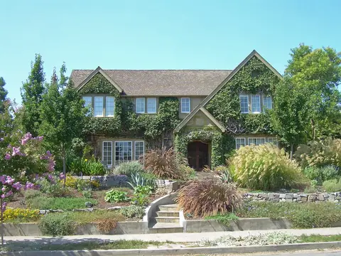 An ivy-covered house above a terraced garden in San Jose, California