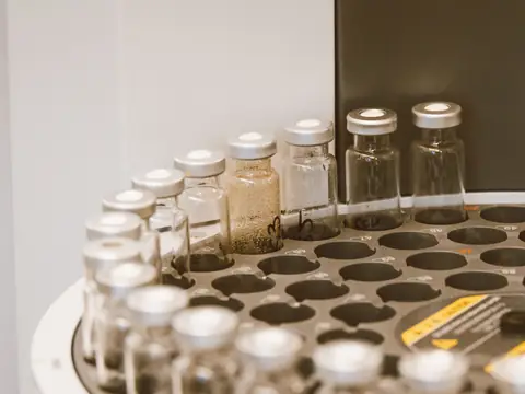 Glass sample vials in a laboratory rack